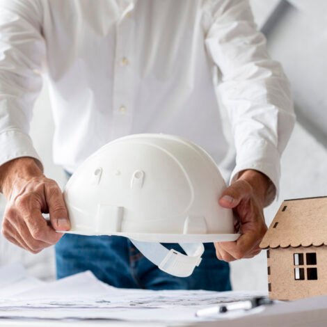 business-man-holding-safety-helmet